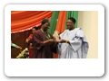 Alhaji Bamanga Tukur presenting an Award